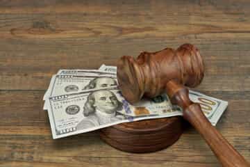 Gavel and money to reflect a child support order 